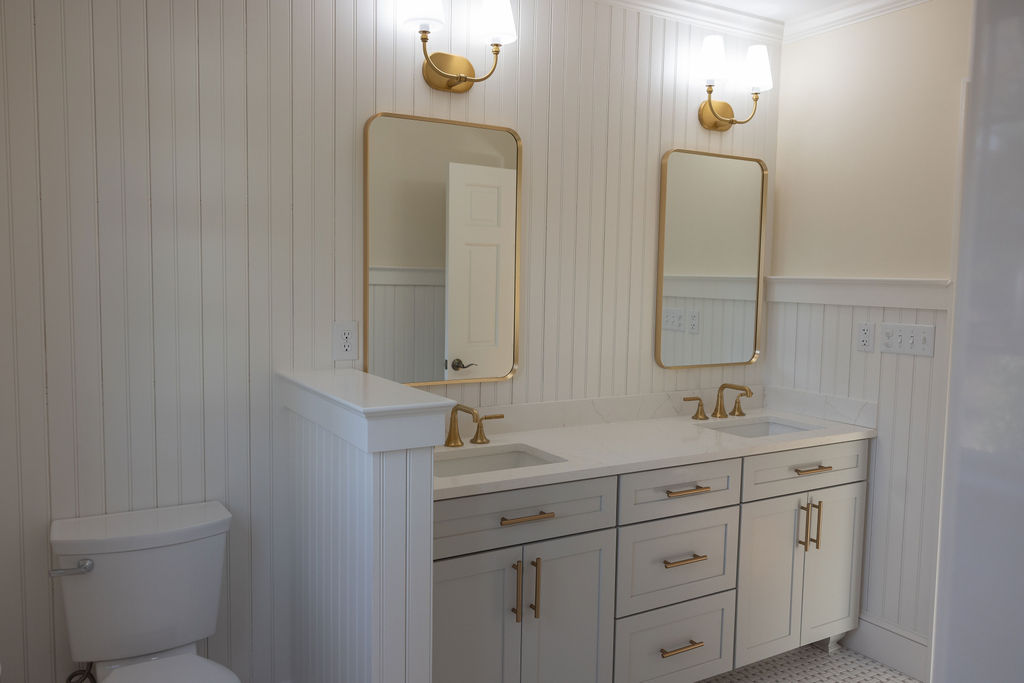 Bathroom vanity with gold fixtures